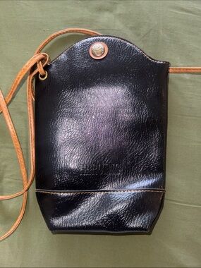 Heroing Black Leather Crossbody Pouch with Tan Strap